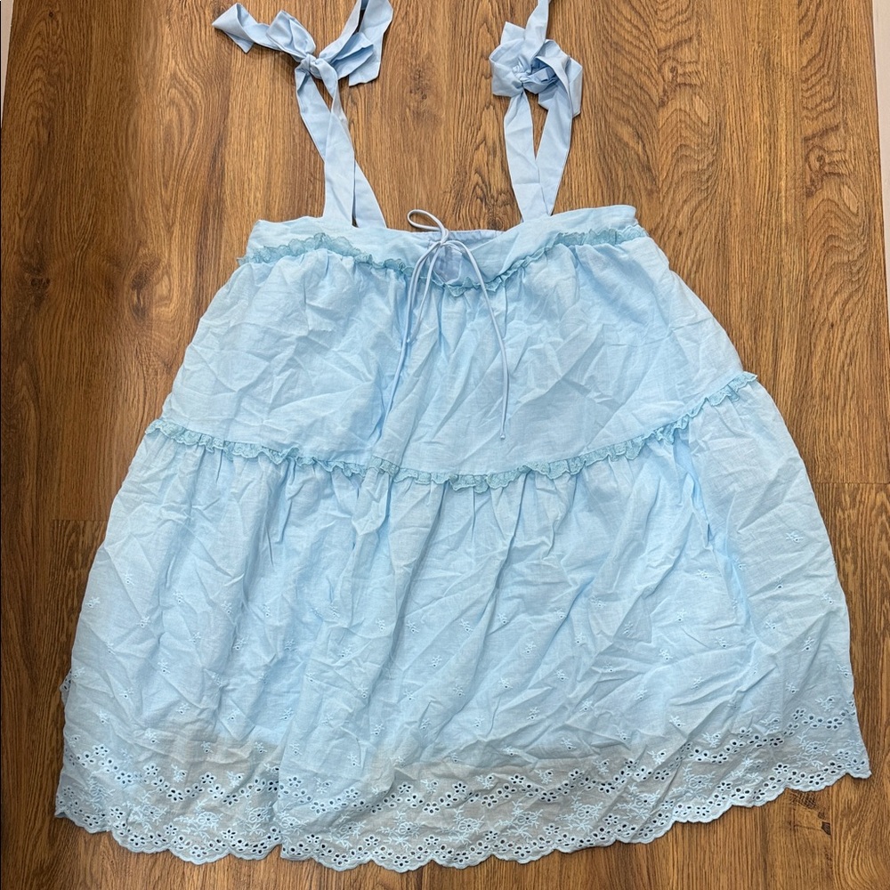 Light Blue Sleeveless Babydoll Dress with Eyelet Hem